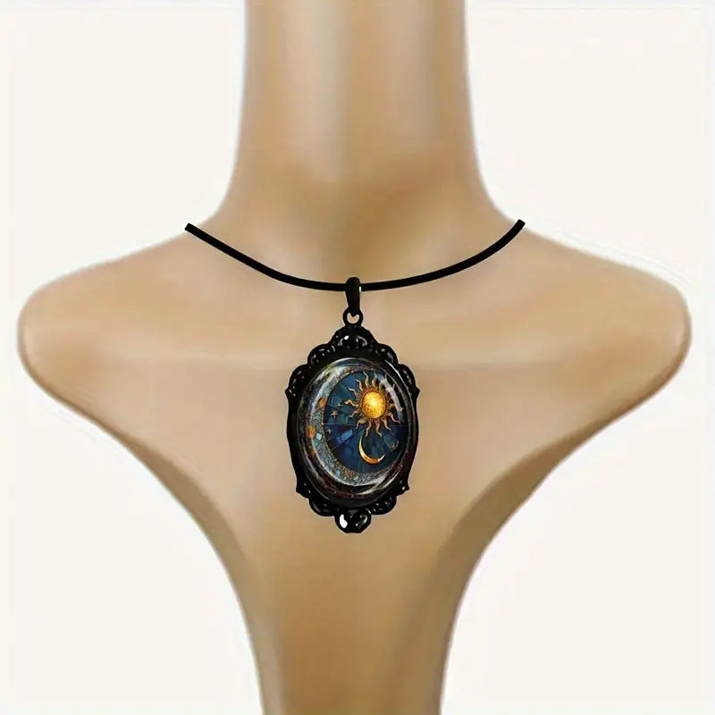 A captivating oval glass pendant necklace - Sun and moon jewelry in a mesmerizing black frame.